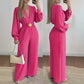 Elegant jumpsuit med V-ringning, vida ben och bälte