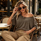 Avslappnad damtopp med kort ärm och off-shoulder