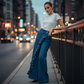 👖✨ Högmidjade vida denimbyxor med volang