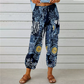 Joggingbyxor i vintage-stil med blommönster och hög midja