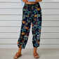 Joggingbyxor i vintage-stil med blommönster och hög midja