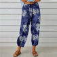 Joggingbyxor i vintage-stil med blommönster och hög midja