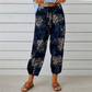 Joggingbyxor i vintage-stil med blommönster och hög midja