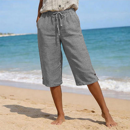 👖🌸 Avslappnade capribyxor med elastisk dragsko och fickor