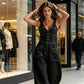 Ärmlös denimjumpsuit med V-ringning för dam