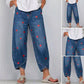 🔥🎁Nyhet 50 % RABATT🔥💖👖 Avslappnade hjärtprintade baggyjeans med avsmalnad vrist