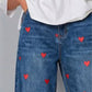 🔥🎁Nyhet 50 % RABATT🔥💖👖 Avslappnade hjärtprintade baggyjeans med avsmalnad vrist