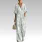Elegant jumpsuit med V-ringning och tryck för damer