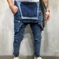 Mäns jeans-overall slitna trasiga hängselbyxor