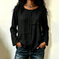 Damtopp med rundhals och texturerad patchwork