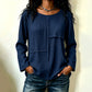 Damtopp med rundhals och texturerad patchwork