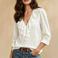 Elegant V-ringad blus med volanger för kvinnor
