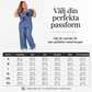 Damtopp med axelbandslös design och vida byxor