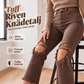 Benförlängande utsvängda jeans
