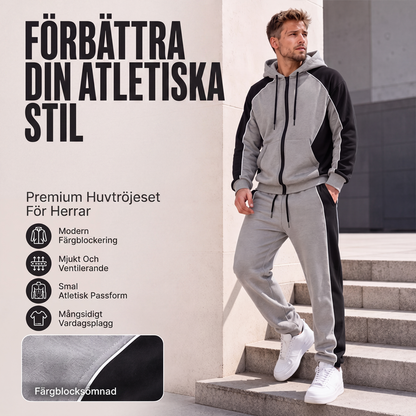 Herrset med huvtröja med dragkedja och färgblock samt träningsbyxor