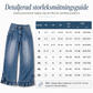 Damjeans med bekväm stretch, vida ben, veckad midja och volangkant