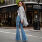 👖 Dammjeans med hög midja och utsvängda ben samt slitna detaljer – Trendiga utsvängda jeans med bekväm passform och tuff denimlook ✨