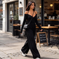 Elegant djup V-ringad jumpsuit med halterneck för kvinnor