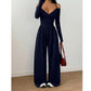 Elegant djup V-ringad jumpsuit med halterneck för kvinnor